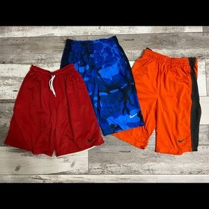 Nike dri fit boys size medium shorts 3 pair in excellent condition.